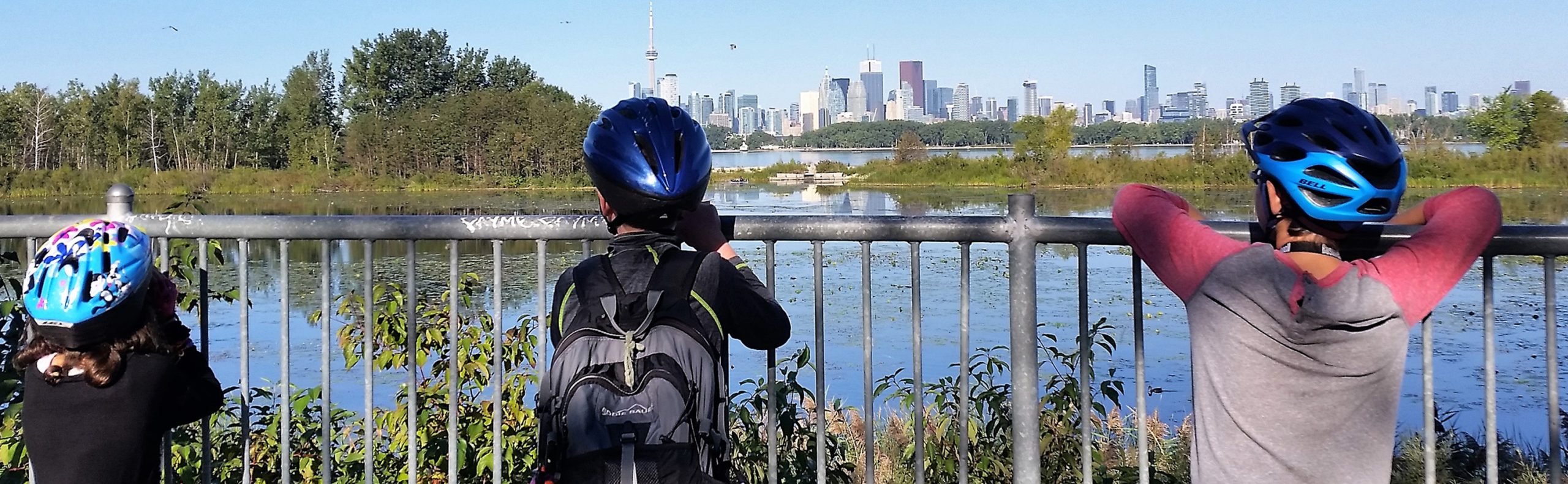 summer campers at Tommy Thompson Park enjoy a view of the Toronto skyline and the Lake Ontario waterfront