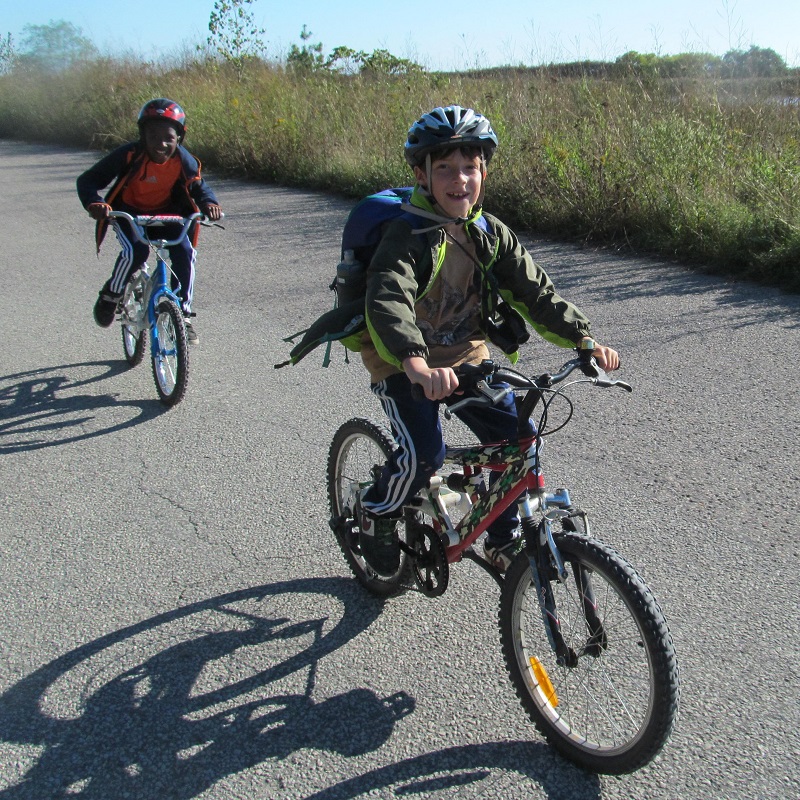 summer campers enjoy wheels on the waterfront bike camp at Tommy Thompson Park