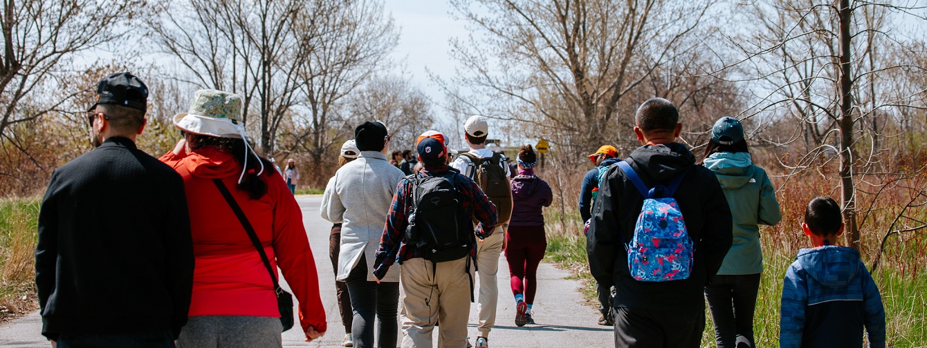 visitors explore the trails at Tommy Thompson Park during the annual Spring Bird Festival