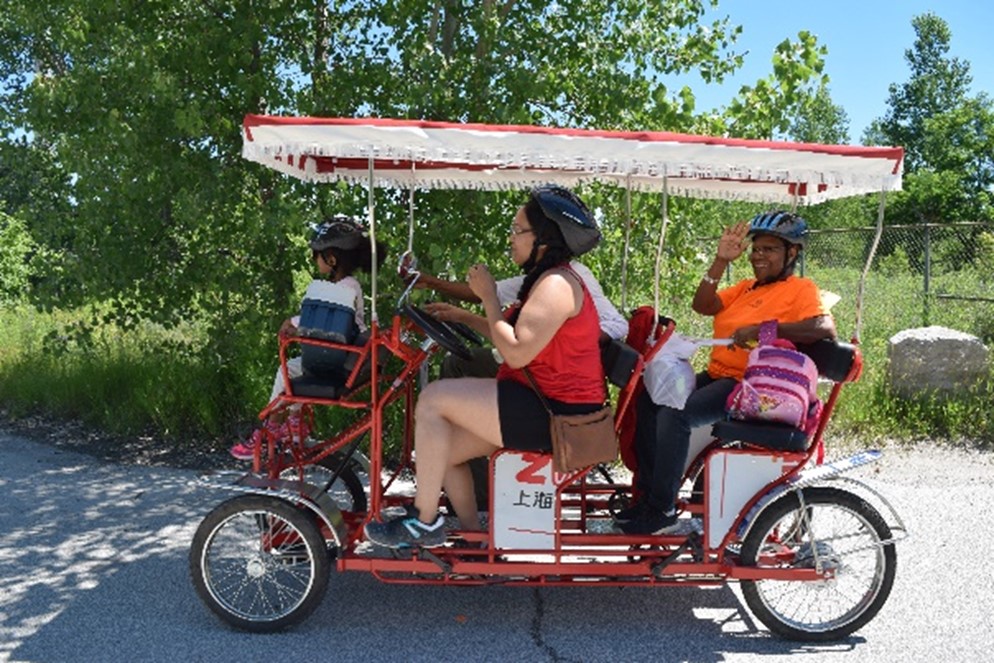 visitors enjoy using a quadcycle to explore the trails at Tommy Thompson Park